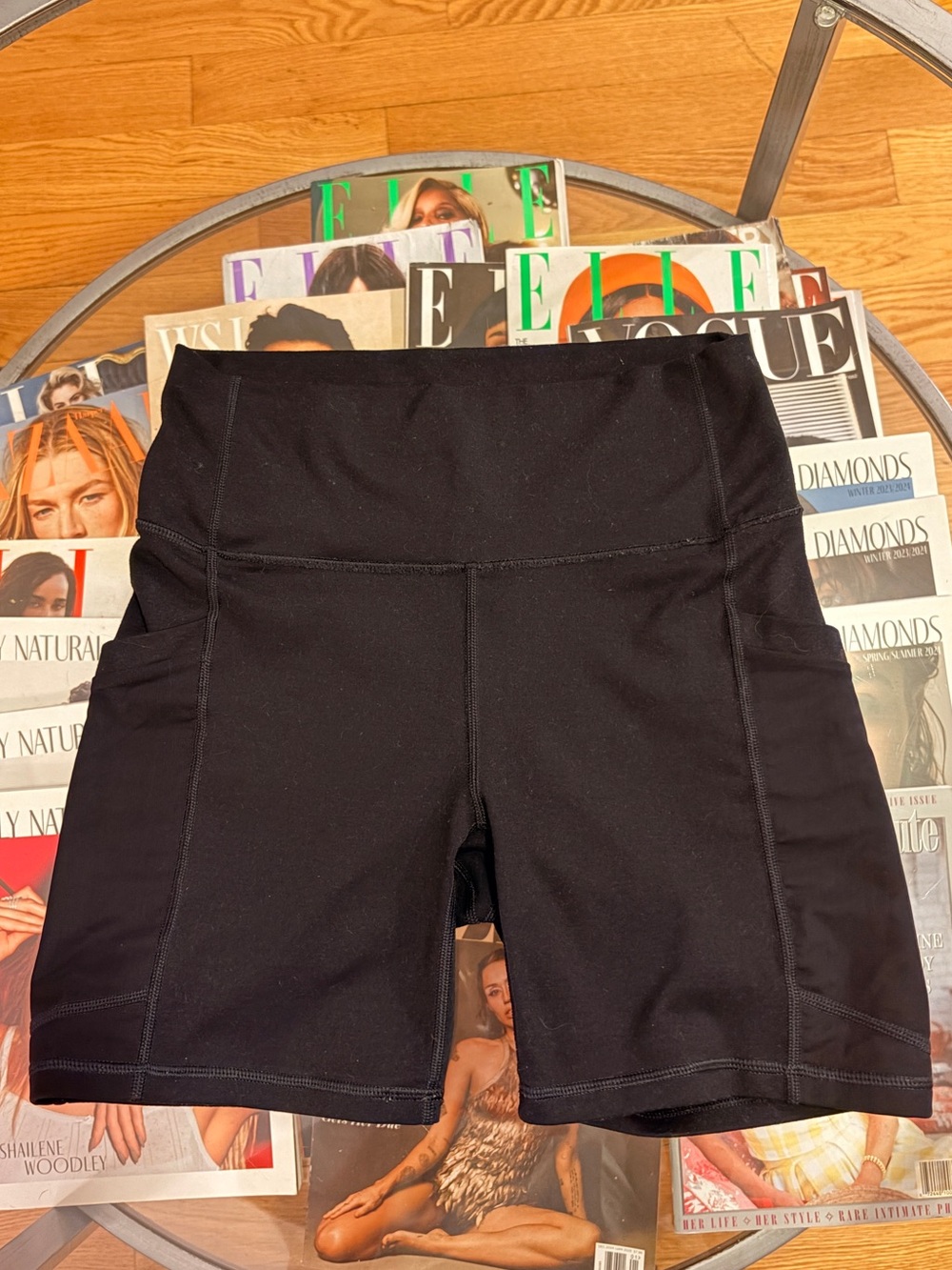 Powerhold by Fabletics Black High-Rise Bike Shorts with Side Panel Mesh Pockets